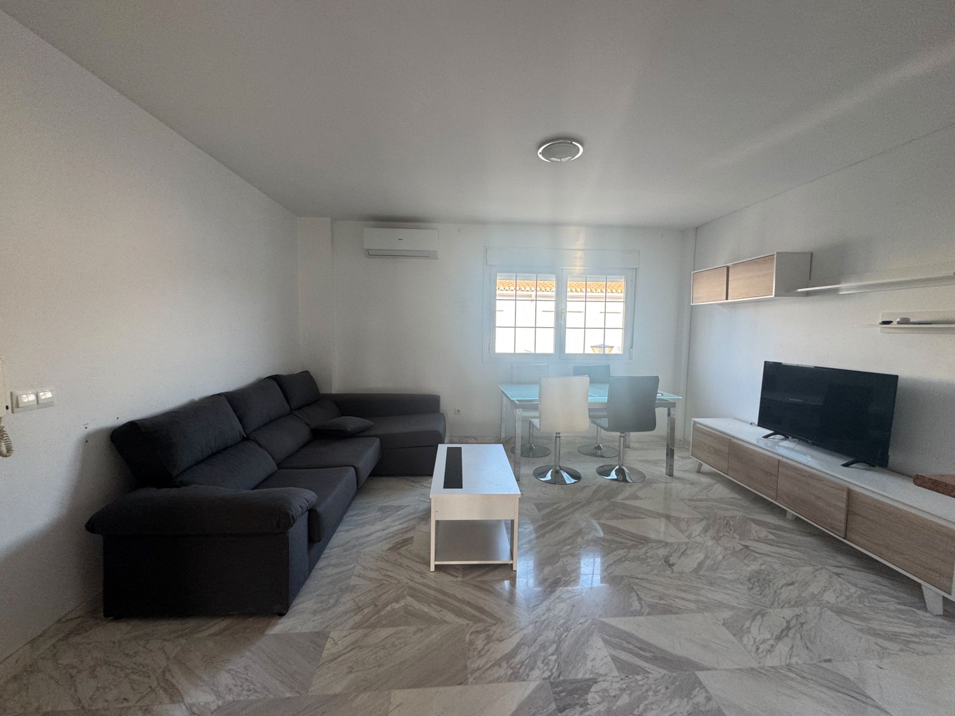 Sala d'estar de Apartament en venda en Albolote amb Aire condicionat, Moblat i Forn
