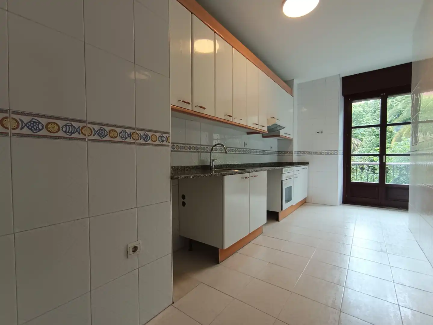 Kitchen of Flat for rent in Gijón   with Heating, Terrace and Balcony