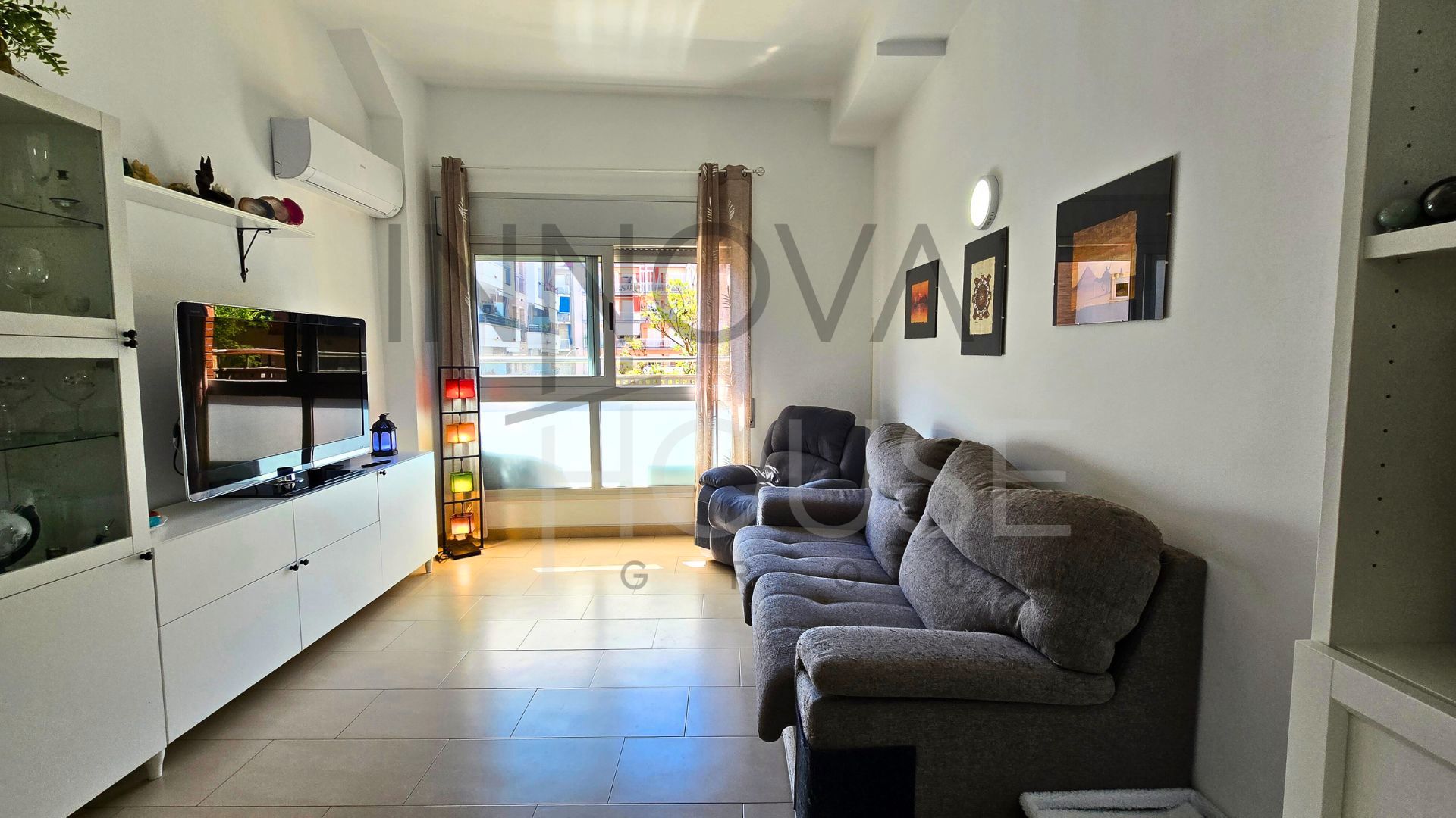 Living room of Flat for sale in Blanes  with Air Conditioner, Heating and Oven