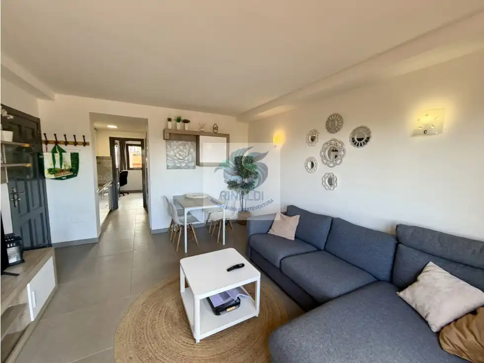 Sala de estar de Apartamento en venta en La Oliva con Terraza, Piscina y Amueblado