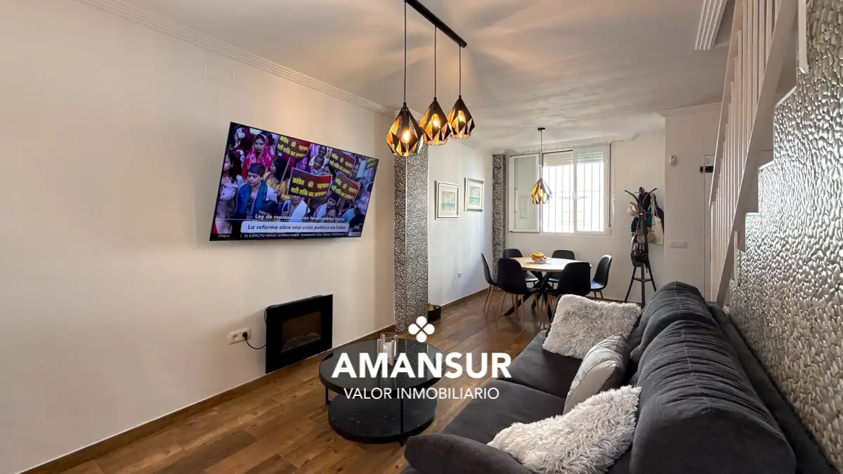 Sala de estar de Casa adosada en venta en Cartaya con Terraza y Alarma