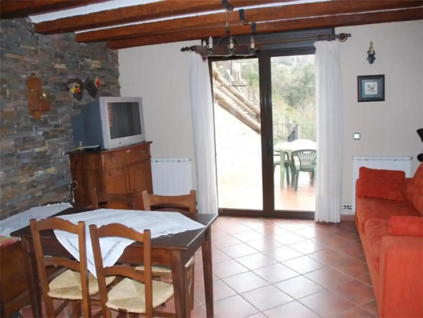 Sala d'estar de Casa adosada en venda en San Juan de Plan amb Balcó