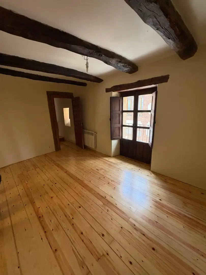 Sala d'estar de Casa adosada en venda en Simancas amb Calefacció, Jardí privat i Parquet