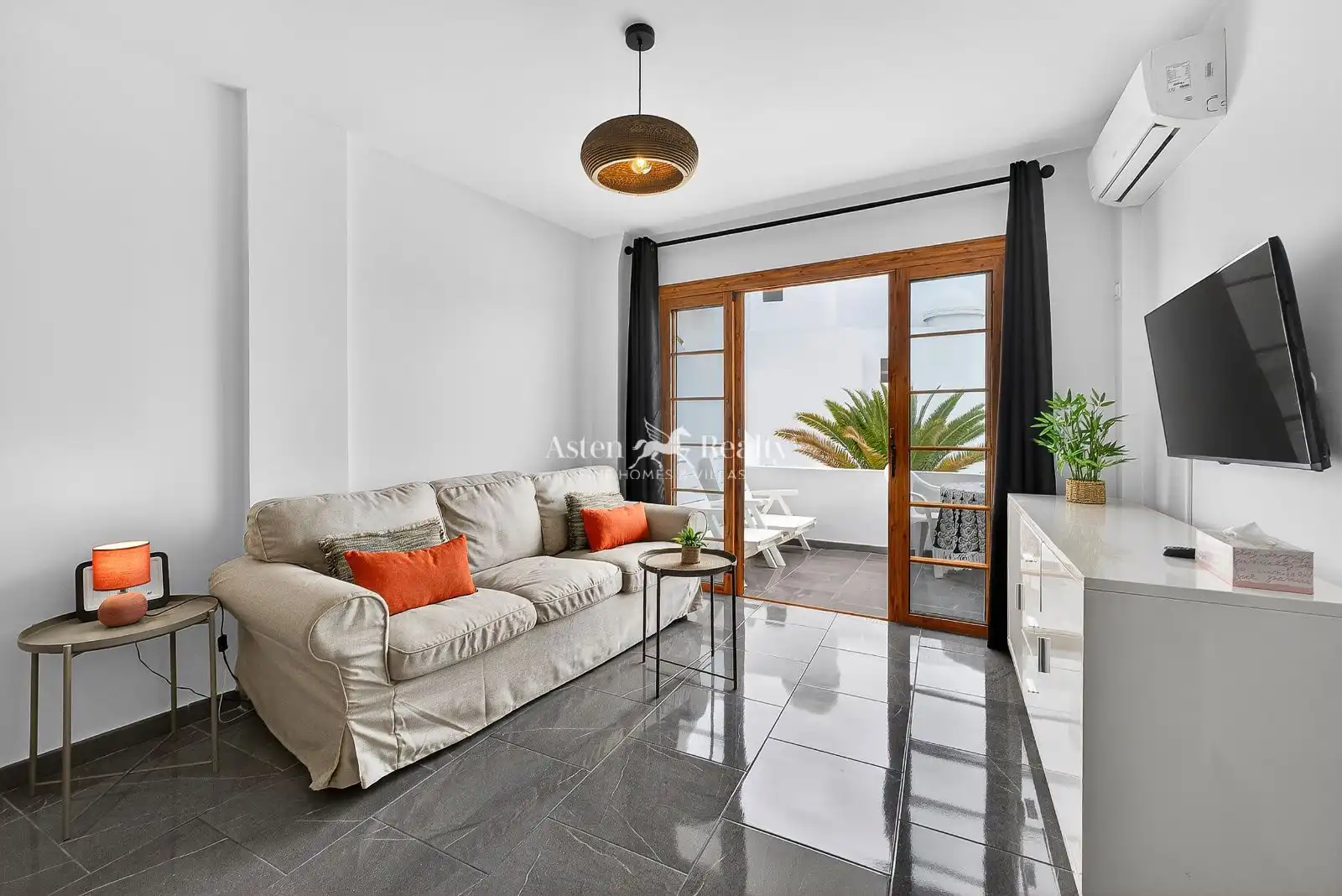 Sala d'estar de Apartament en venda en Adeje amb Aire condicionat, Terrassa i Piscina