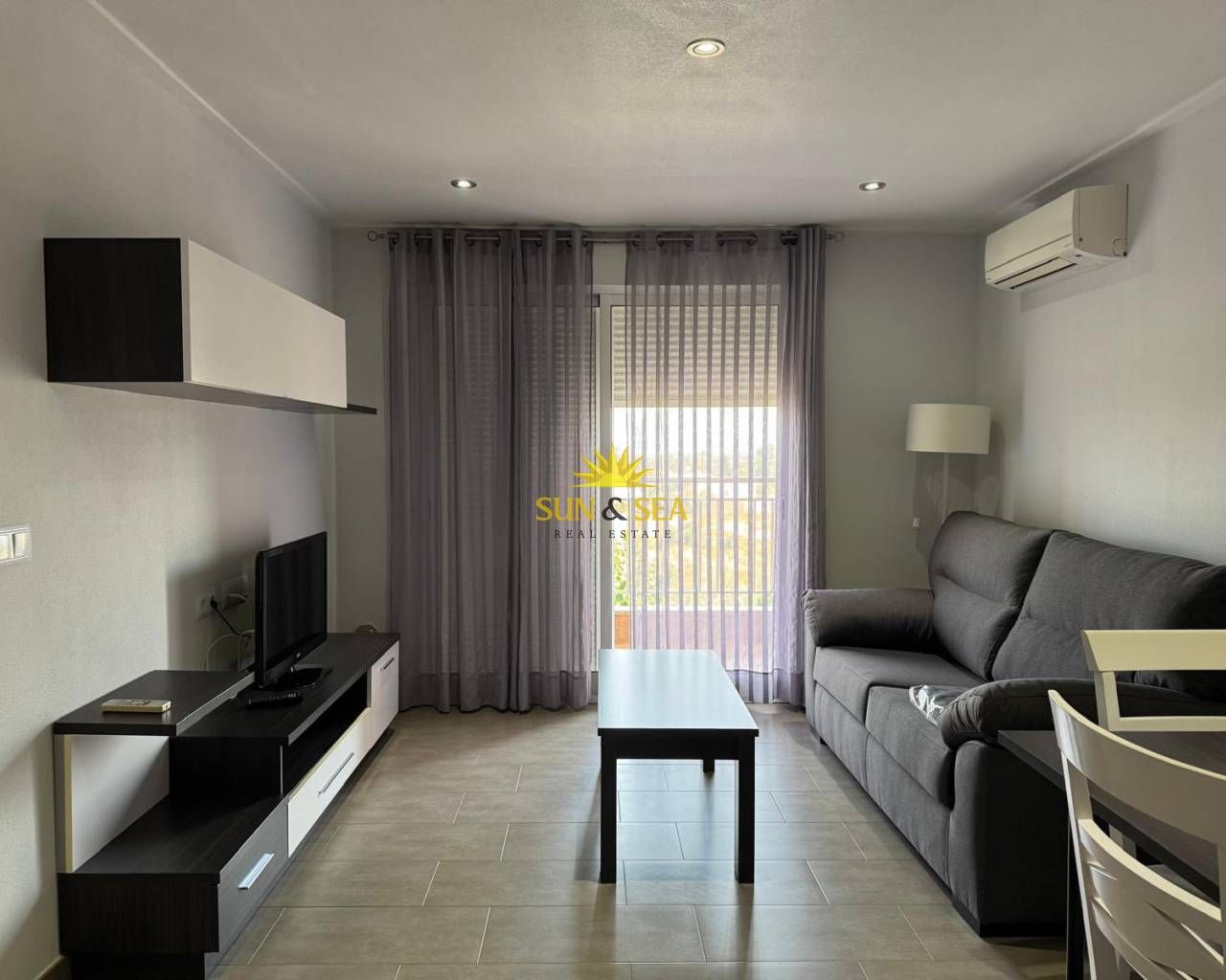 Sala d'estar de Apartament de lloguer en  Murcia Capital amb Aire condicionat, Calefacció i Moblat