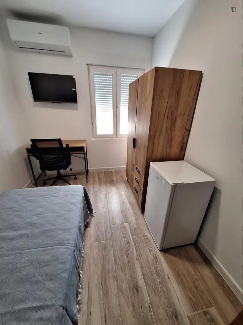 Habitación de Apartamento de alquiler en Valencia con Aire acondicionado, Calefacción y Amueblado