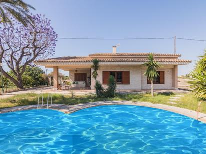 Vista exterior de Casa o xalet en venda en Elche / Elx amb Jardí privat, Parquet i Piscina