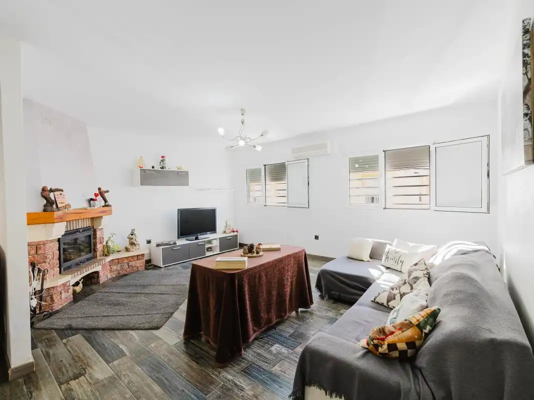 Sala d'estar de Casa adosada en venda en Vélez-Málaga amb Aire condicionat, Calefacció i Terrassa