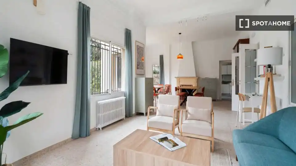 Sala de estar de Piso para compartir en Madrid con Aire acondicionado, Terraza y Amueblado