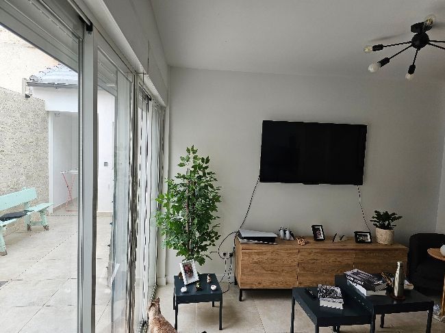 Living room of Single-family semi-detached for sale in  Madrid Capital  with Air Conditioner, Heating and Furnished