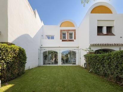 Exterior view of Single-family semi-detached for sale in Estepona  with Air Conditioner, Terrace and Swimming Pool