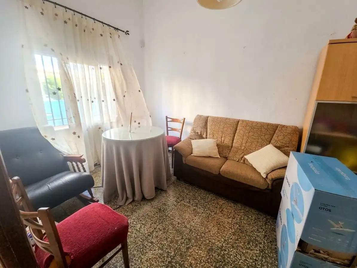 Sala d'estar de Casa o xalet en venda en Alzira amb Jardí privat, Terrassa i Traster