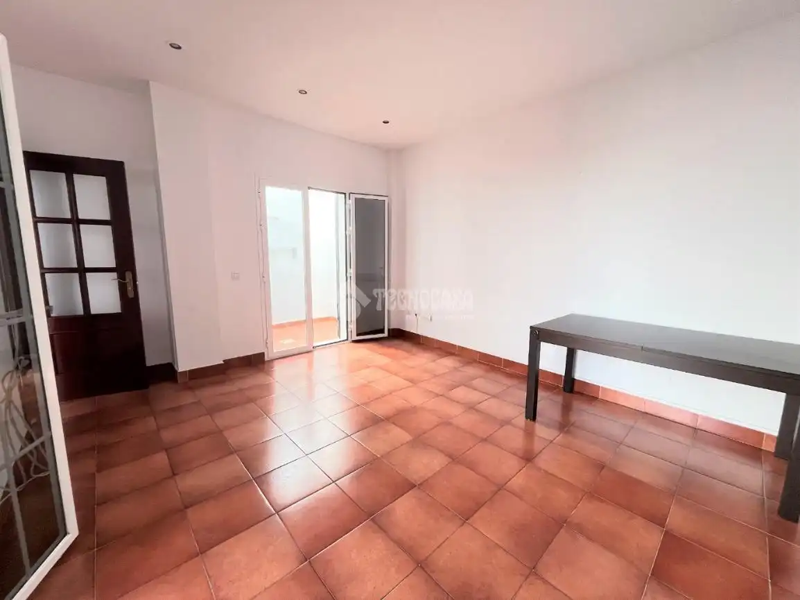 Sala d'estar de Casa adosada en venda en San Fernando amb Terrassa i Balcó