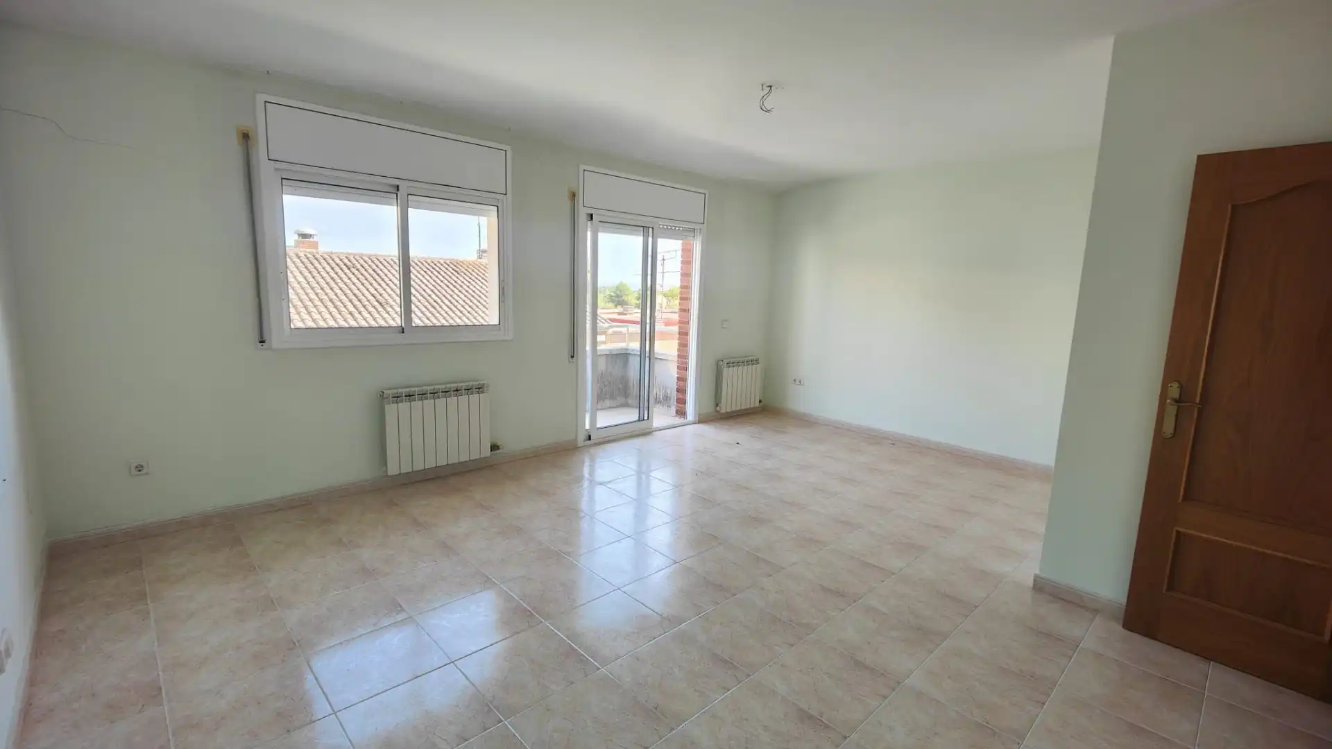 Sala d'estar de Casa adosada en venda en Vilanova i la Geltrú