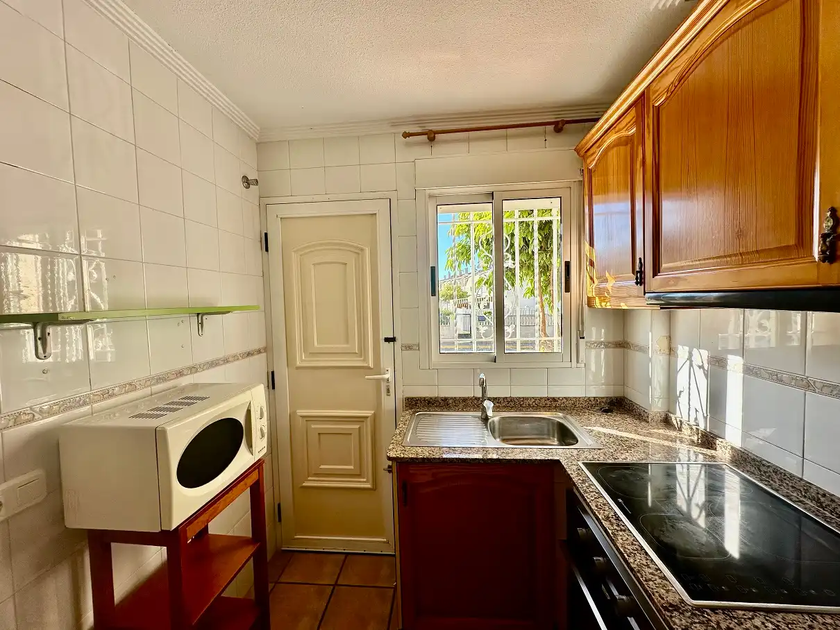 Cuina de Casa adosada en venda en Santa Pola amb Aire condicionat, Jardí privat i Terrassa