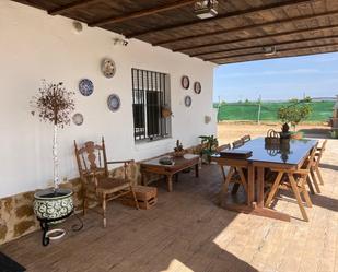 Terrace of House or chalet for sale in La Algaba  with Air Conditioner, Private garden and Storage room