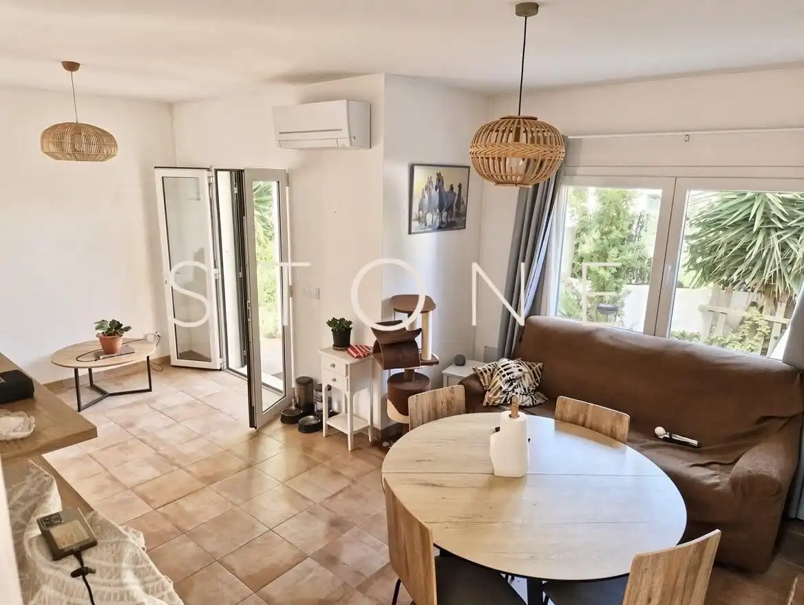 Sala d'estar de Casa o xalet en venda en Cala Blanca