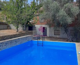 Piscina de Casa o xalet en venda en Alanís amb Jardí privat, Terrassa i Traster