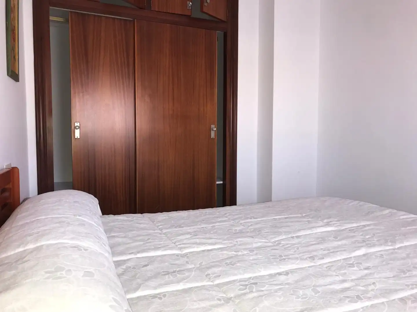Dormitori de Apartament de lloguer en Chipiona amb Terrassa