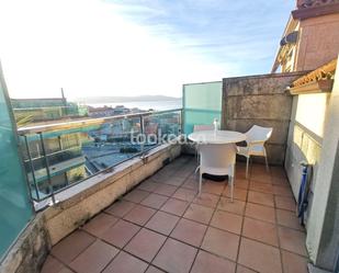 Vista exterior de Àtic en venda en Sanxenxo amb Calefacció, Parquet i Terrassa