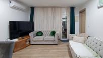 Living room of Planta baja for sale in Sant Feliu de Guíxols  with Air Conditioner, Oven and Washing machine