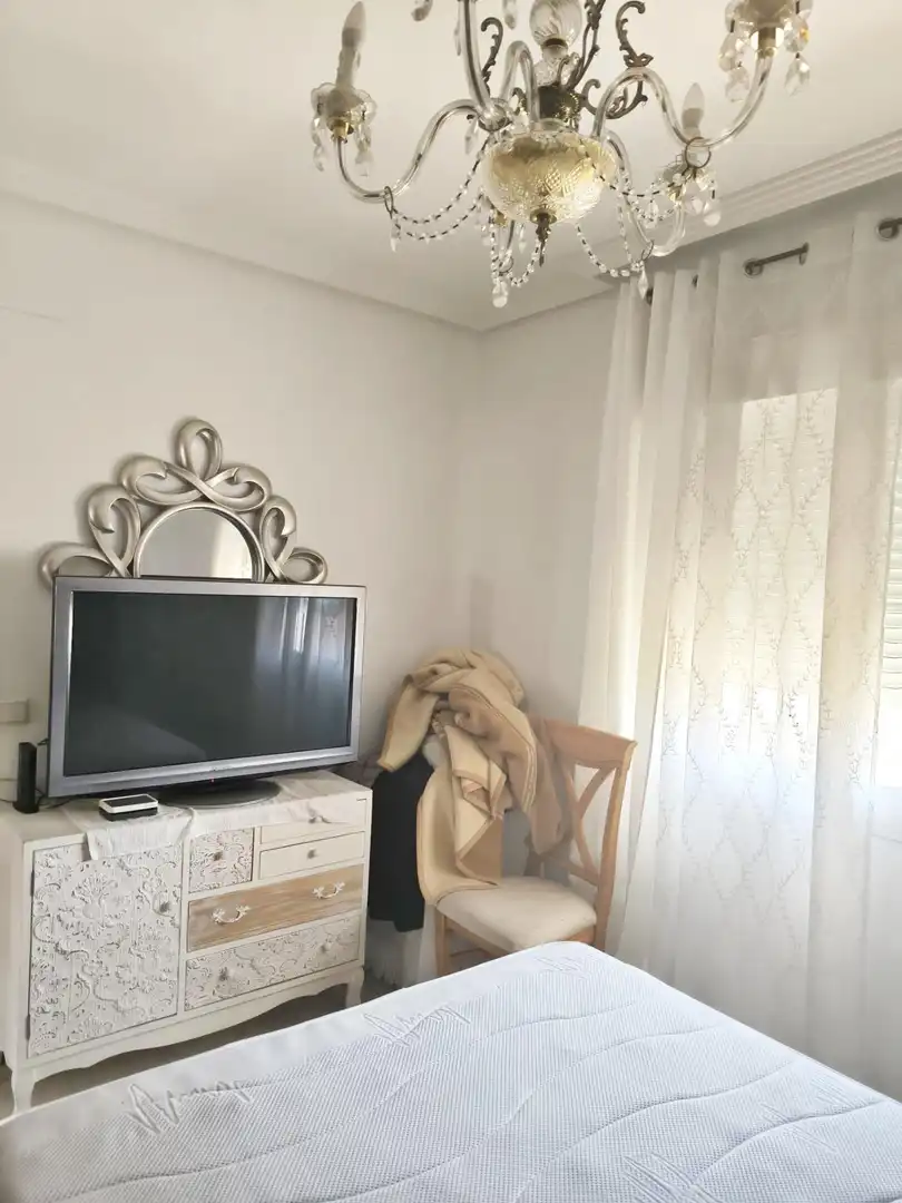 Habitación de Casa adosada en venta en Málaga con Aire acondicionado, Calefacción y Jardín privado