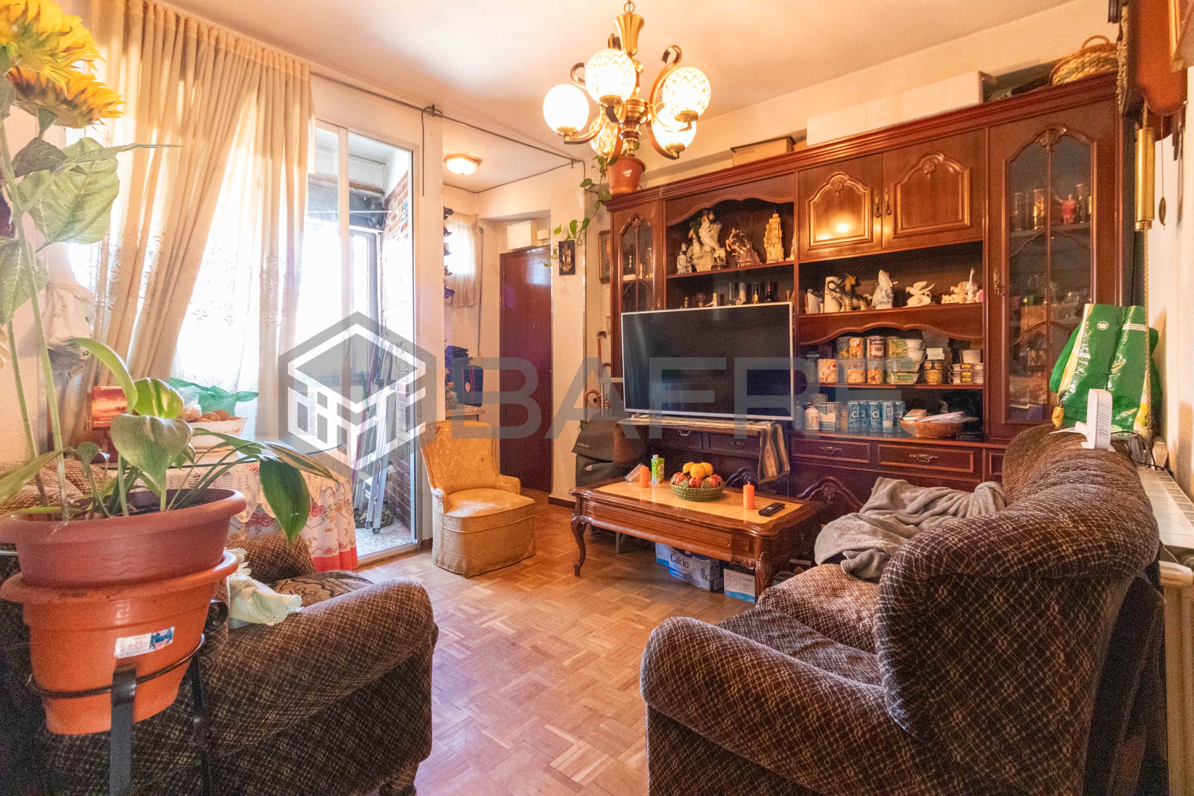 Living room of Flat for sale in  Madrid Capital  with Air Conditioner, Parquet flooring and Terrace