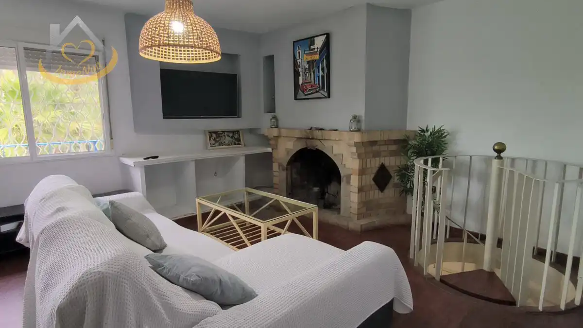 Sala de estar de Casa o chalet en venta en Cartaya con Aire acondicionado, Jardín privado y Terraza