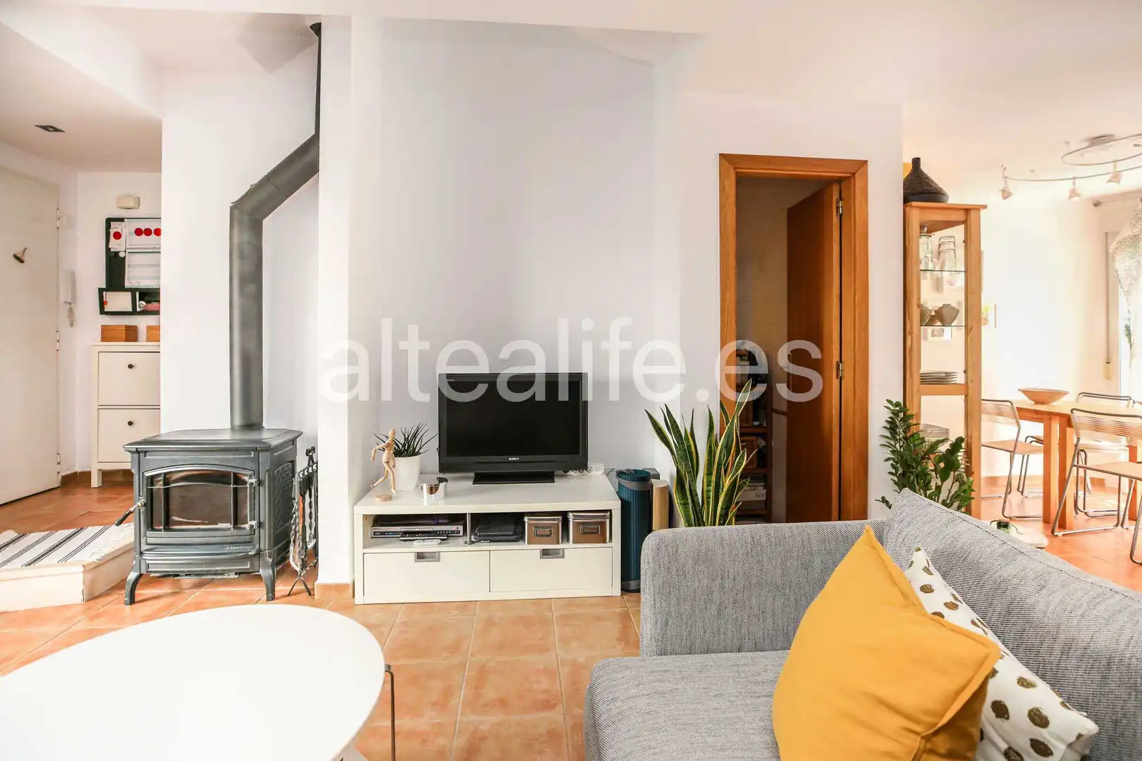 Sala d'estar de Casa adosada en venda en La Nucia amb Terrassa i Piscina comunitària