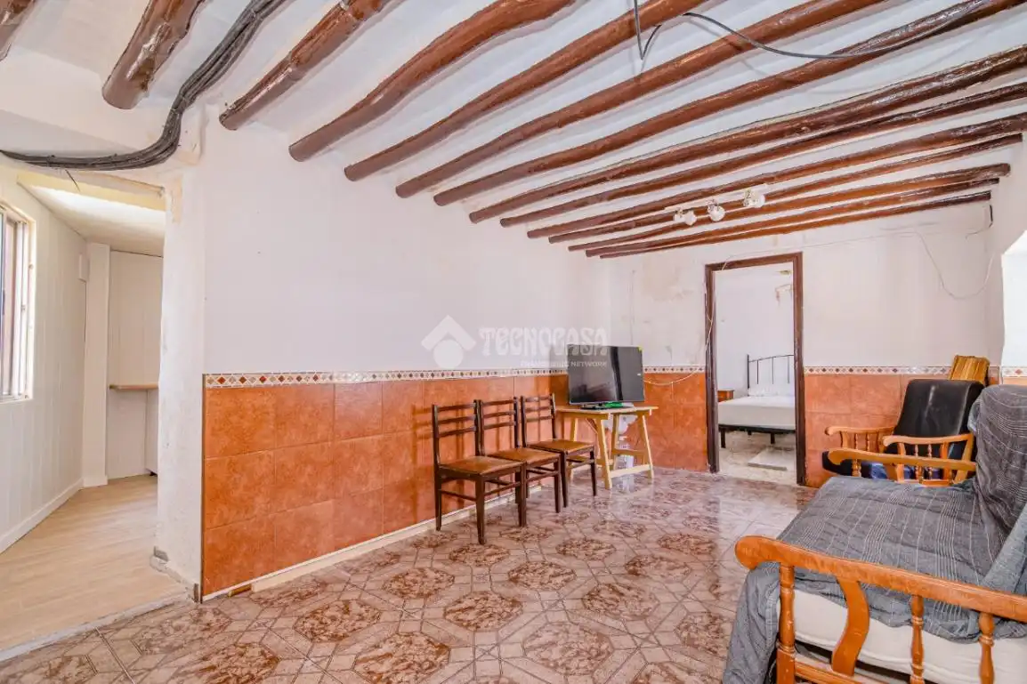 Sala d'estar de Casa adosada en venda en Loja