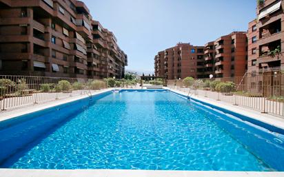 Swimming pool of Flat to rent in  Granada Capital  with Air Conditioner, Heating and Private garden