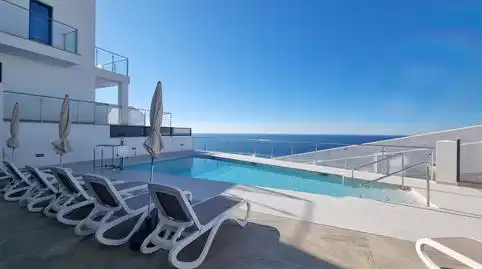 Swimming pool of Duplexes for sale in Nerja  with Air Conditioner, Heating and Terrace