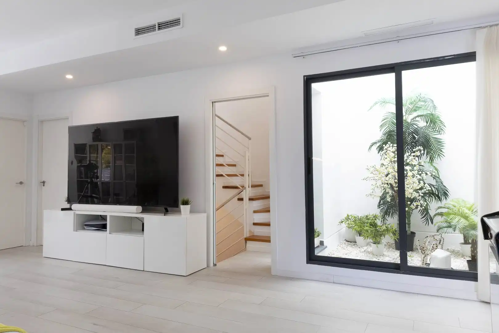 Sala de estar de Casa adosada en venta en San Antonio de Benagéber con Aire acondicionado, Calefacción y Terraza