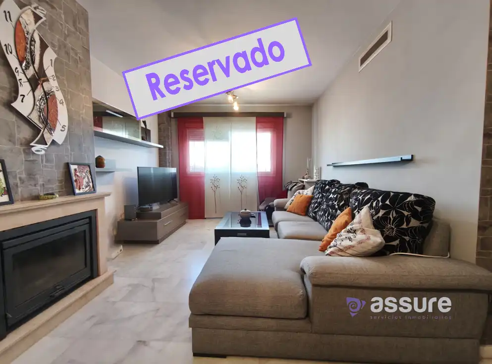 Sala de estar de Casa adosada en venta en Huelva con Aire acondicionado, Calefacción y Jardín privado
