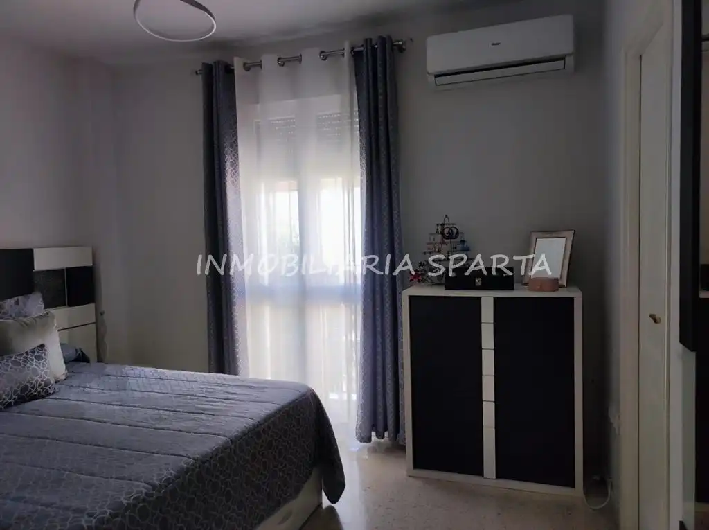 Habitación de Casa adosada en venta en Coria del Río con Aire acondicionado, Terraza y Trastero