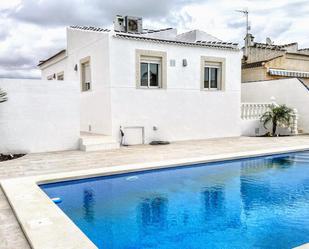 Swimming pool of Single-family semi-detached for sale in Torrevieja  with Air Conditioner, Terrace and Swimming Pool