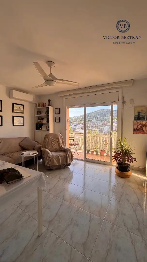 Wohnzimmer von Dachboden zum Verkauf in Premià de Mar mit Klimaanlage, Ofen und Balkon
