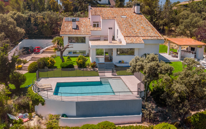 Exterior view of Single-family semi-detached for sale in Las Rozas de Madrid  with Air Conditioner, Terrace and Swimming Pool