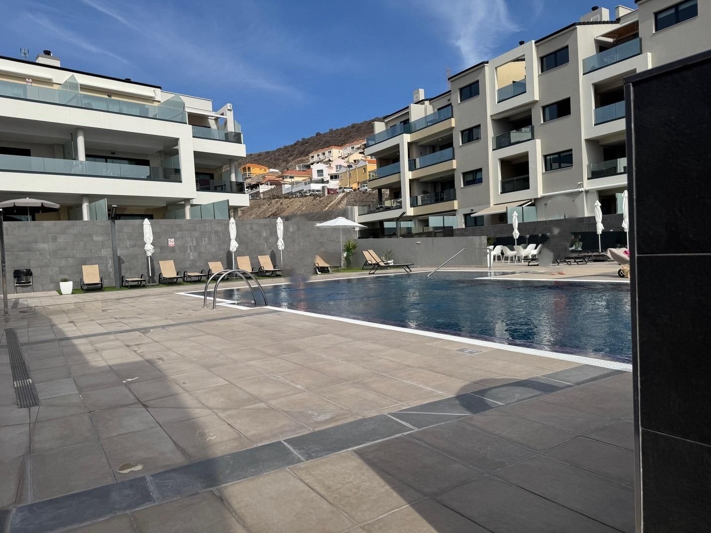 Piscina de Apartament de lloguer en Mogán amb Aire condicionat i Piscina comunitària