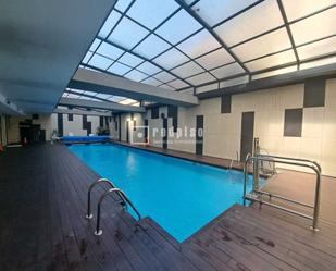 Swimming pool of Duplex for sale in  Madrid Capital  with Air Conditioner, Heating and Storage room