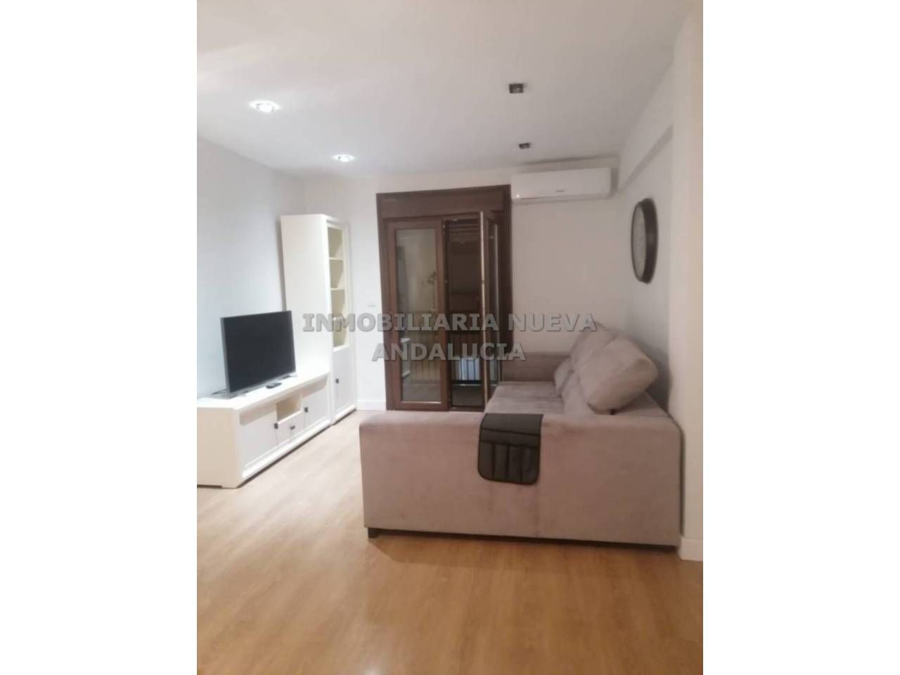 Living room of Flat for sale in  Almería Capital  with Air Conditioner, Parquet flooring and Terrace