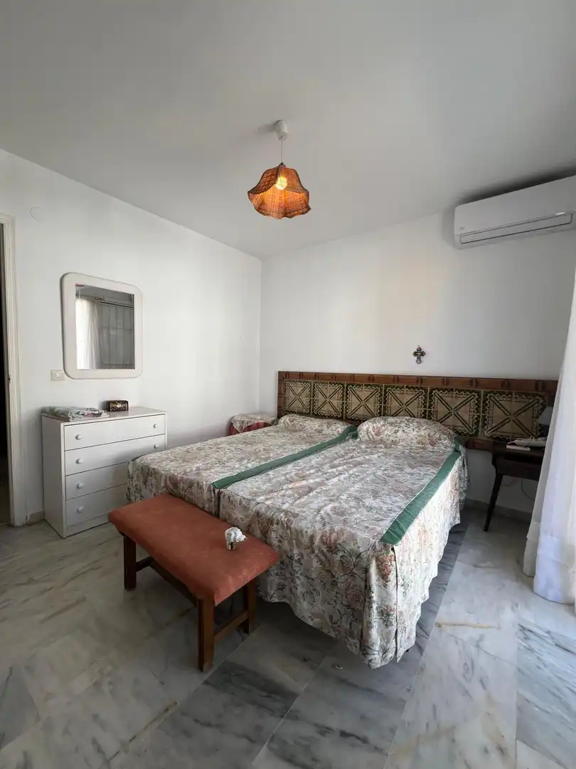 Dormitori de Casa adosada en venda en Fuengirola amb Aire condicionat, Jardí privat i Terrassa