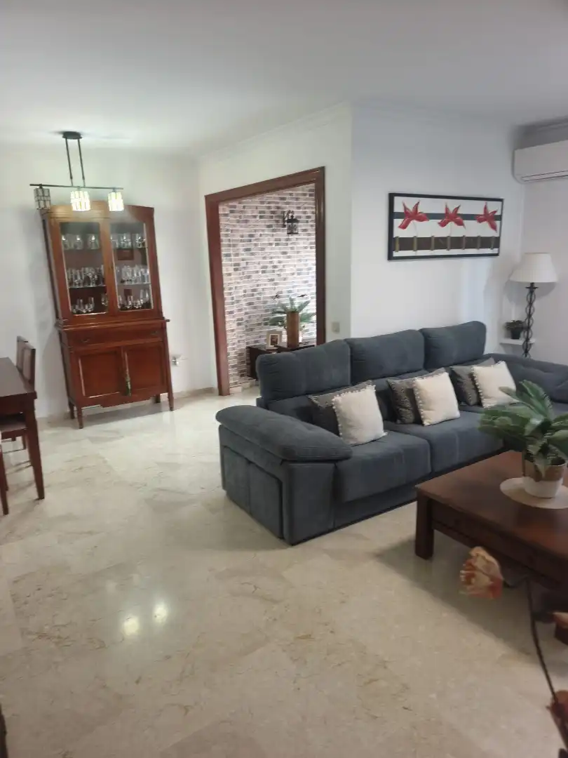 Sala d'estar de Casa adosada en venda en Melilla amb Aire condicionat, Jardí privat i Terrassa