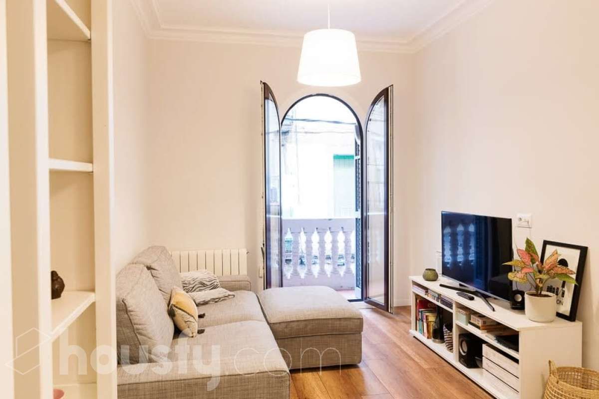 Sala d'estar de Pis de lloguer en  Barcelona Capital amb Calefacció, Parquet i Moblat