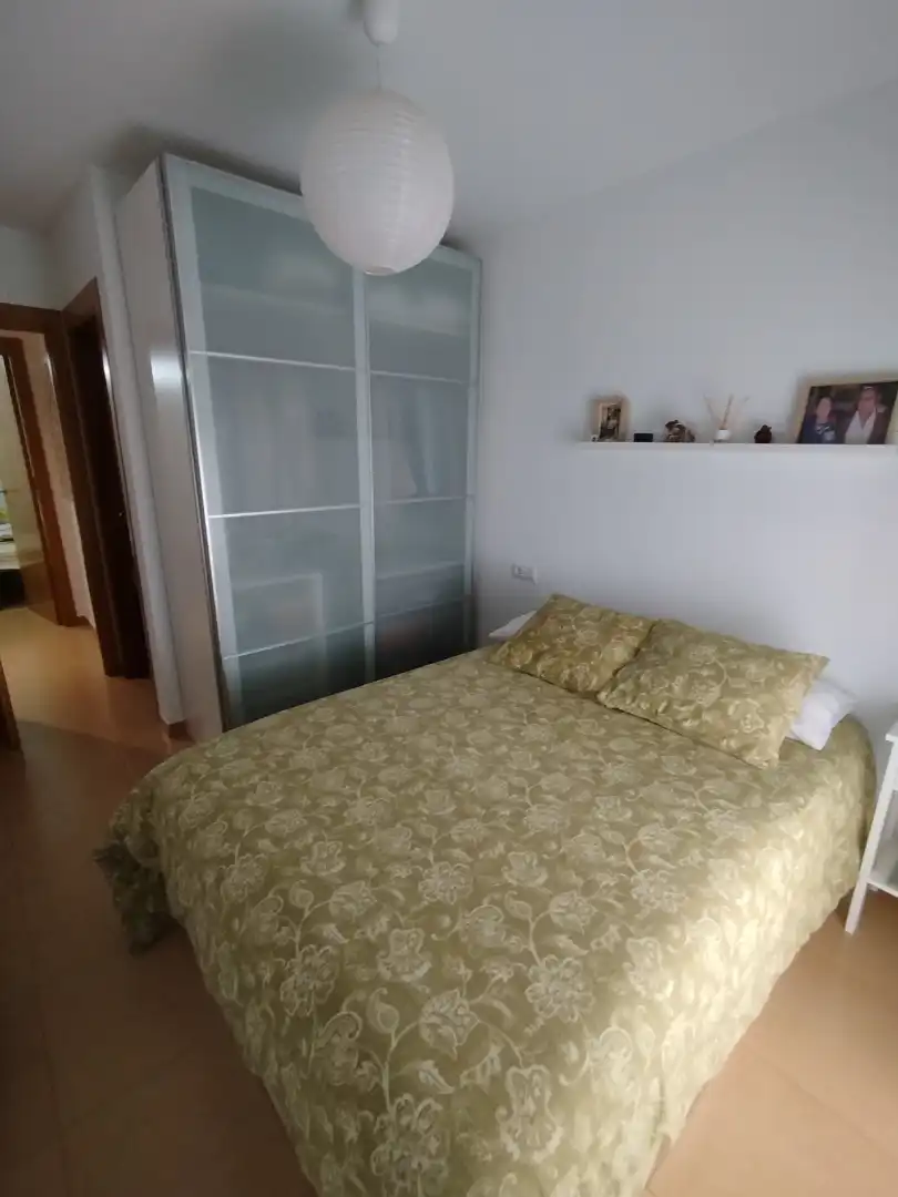 Schlafzimmer von Wohnung zum Verkauf in Vilallonga del Camp mit Klimaanlage, Heizung und Privatgarten