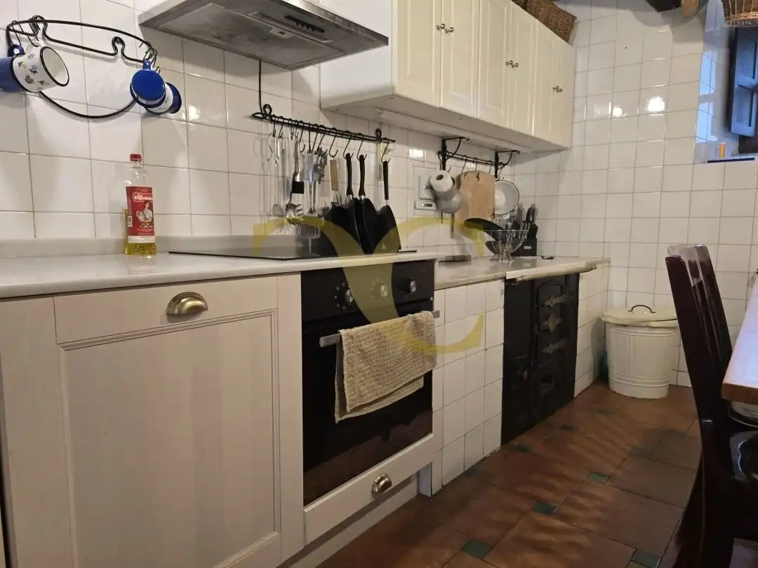 Cuina de Casa adosada en venda en Llanes amb Calefacció, Jardí privat i Terrassa