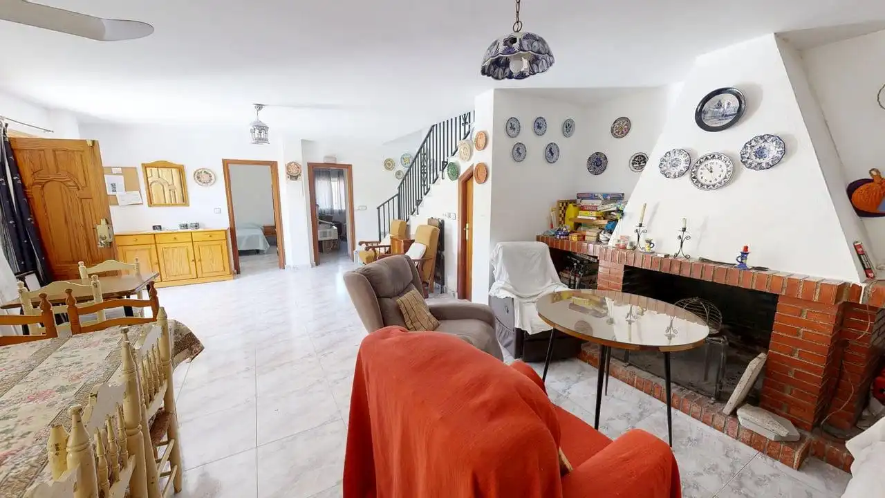 Sala d'estar de Casa o xalet en venda en Jaén amb Traster i Piscina comunitària
