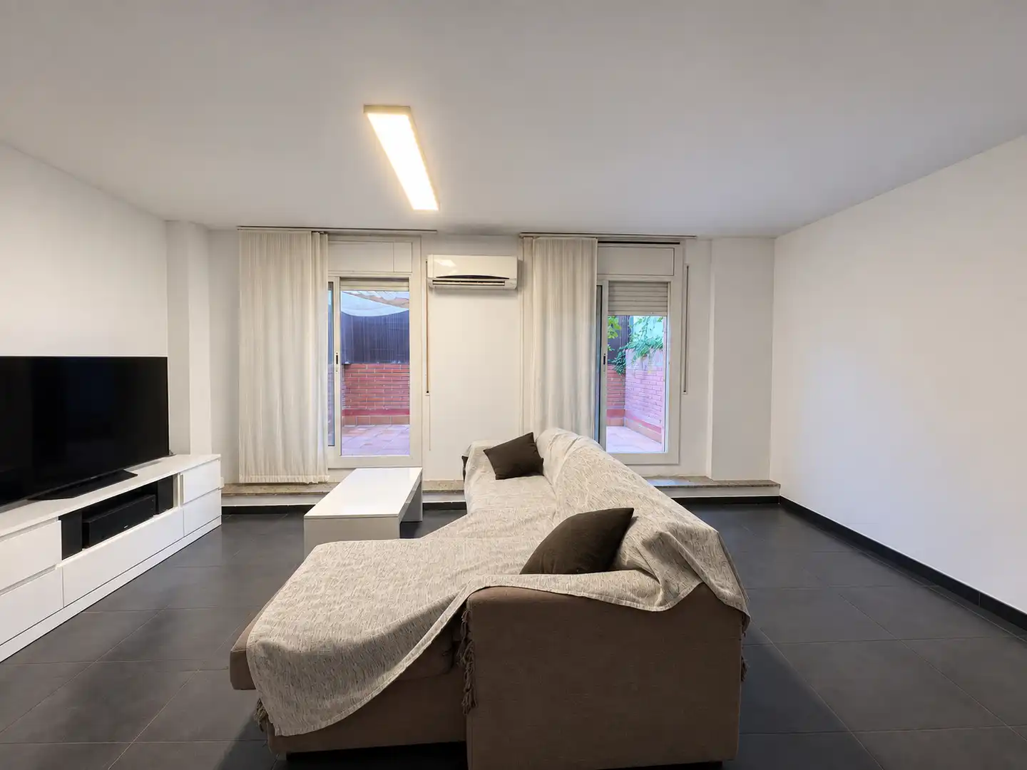 Sala d'estar de Pis en venda en Terrassa amb Aire condicionat, Terrassa i Moblat