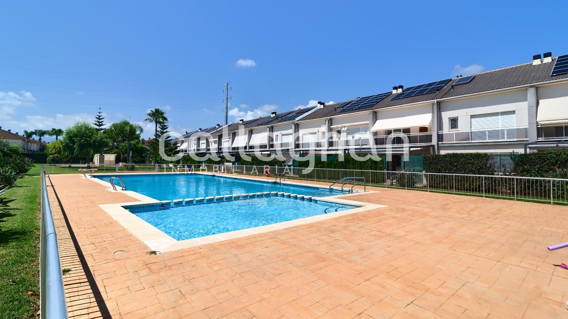 Swimming pool of Single-family semi-detached for sale in Gandia  with Air Conditioner, Heating and Private garden