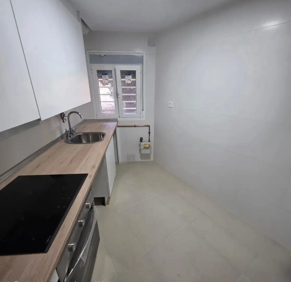 Kitchen of Flat for sale in Madrid  with Heating, Private garden and Furnished